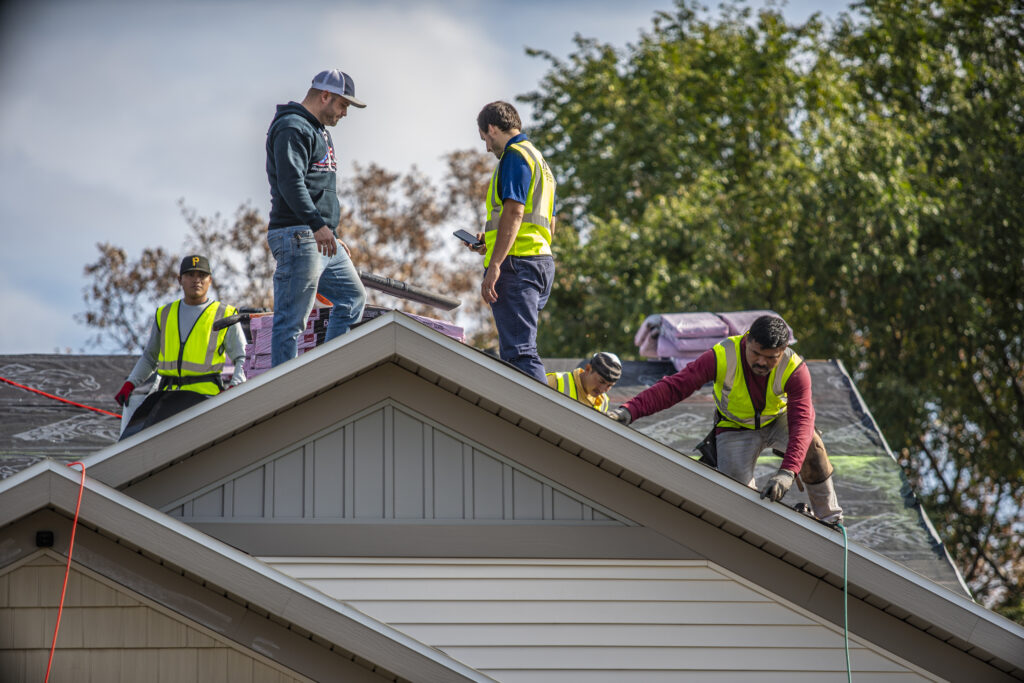 The Ascension Roofing team doing roof repair