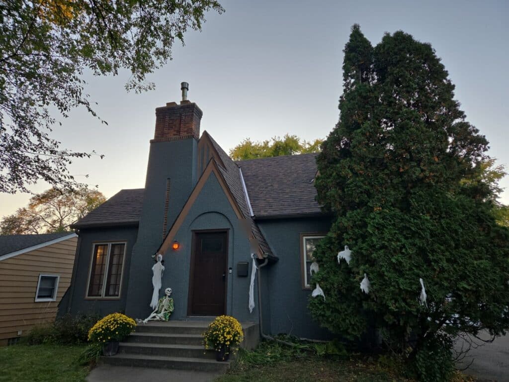 New shingle roof on a story-and-a-half stucco home in St. Louis Park, MN