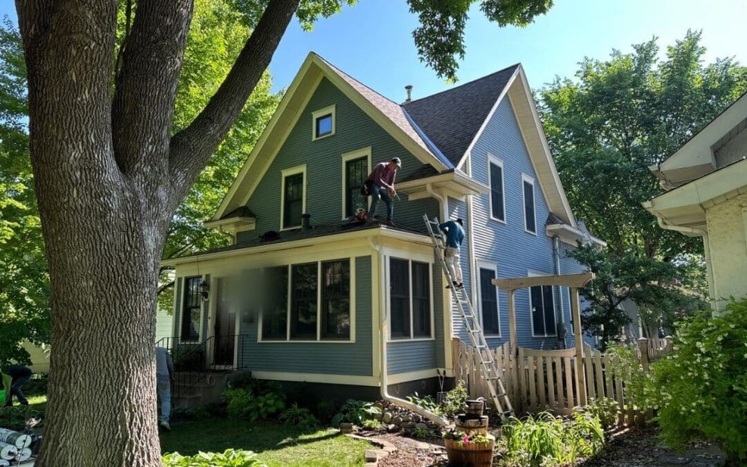 Ascension Roofing crew replacing the roof on a two-story Minneapolis home